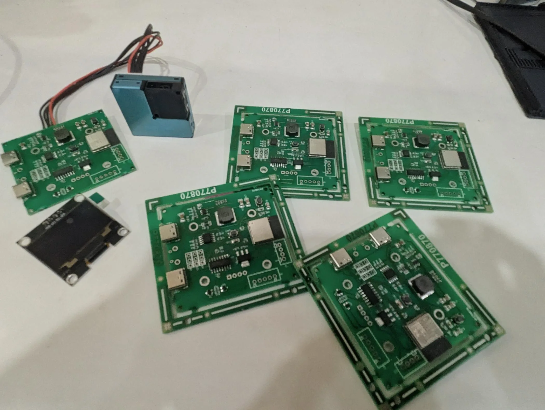 Batch of fabricated custom ESP32-C3 air quality monitor PCBs at DigitalMonk lab