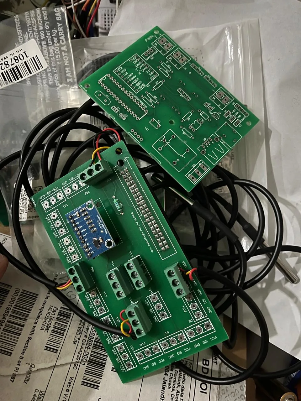 Two custom Raspberry Pi HAT PCB designs showing different I/O configurations developed by DigitalMonk