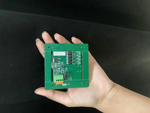 Front of the custom ESP32-S3 curtain controller PCB showing USB-C, 4-pin terminal block and motor-drive MOSFETs