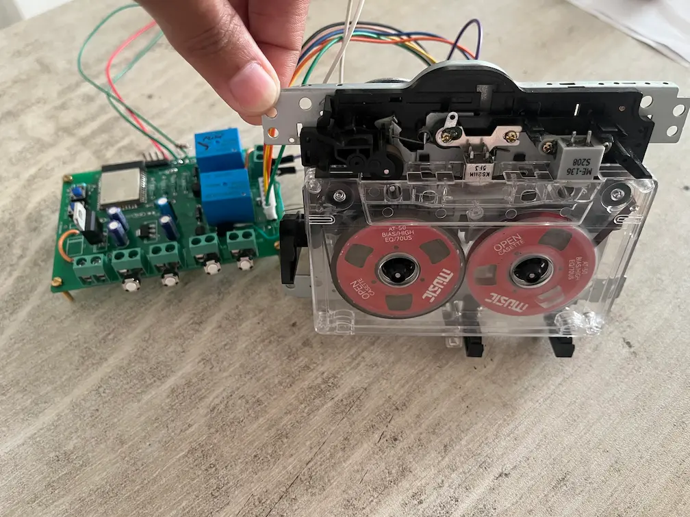 Custom ESP32 PCB with relay modules connected to the cassette deck mechanism
