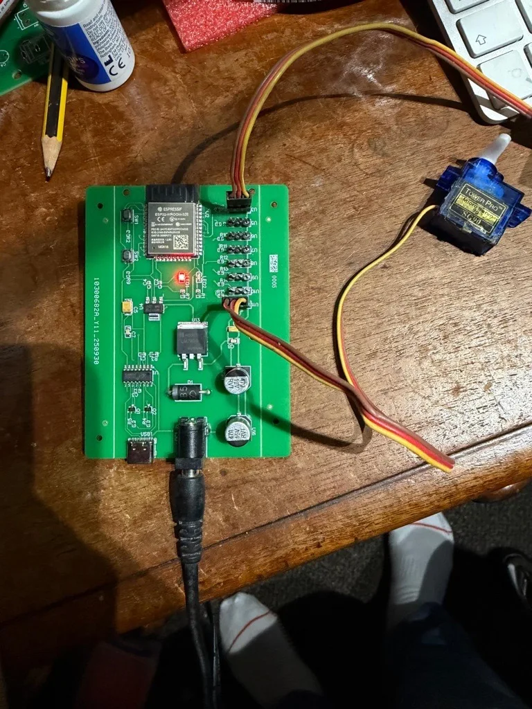 ESP32 railway controller under test driving a servo motor