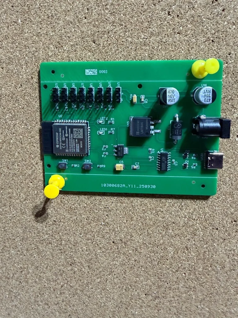 Custom ESP32 model railway controller PCB with eight servo channels