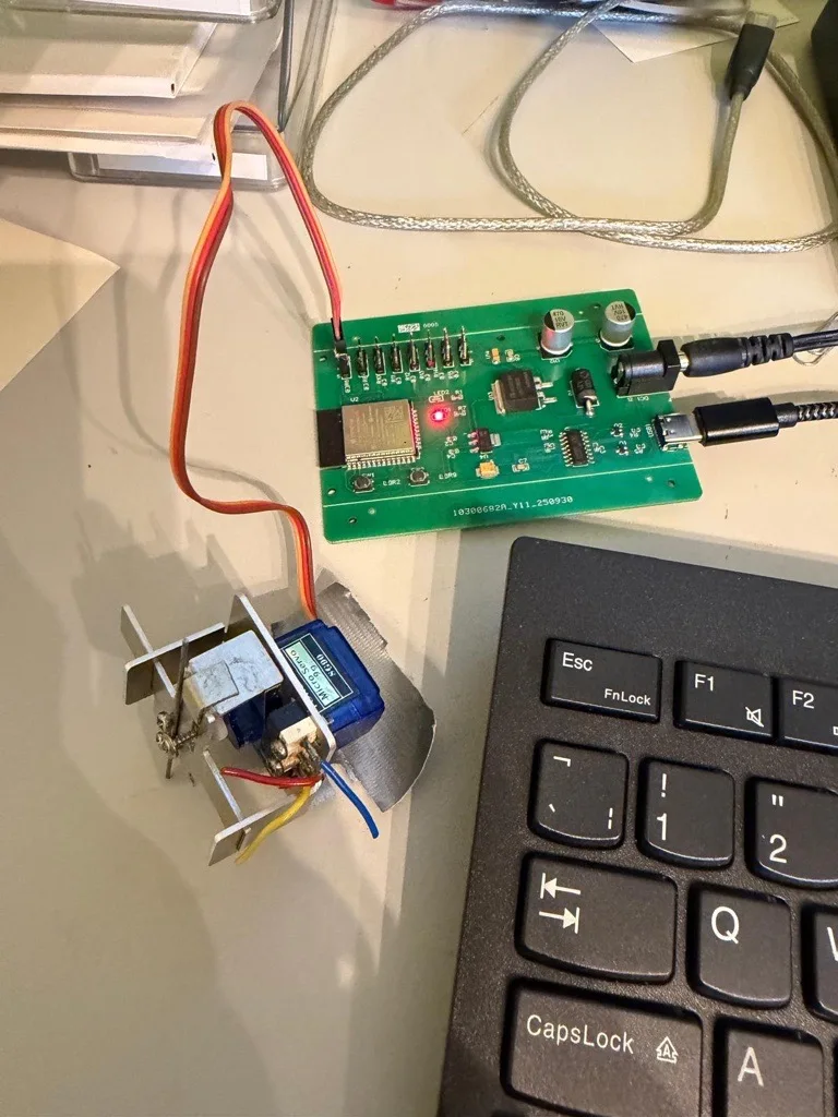 ESP32 controller driving a servo to switch a model railway track point