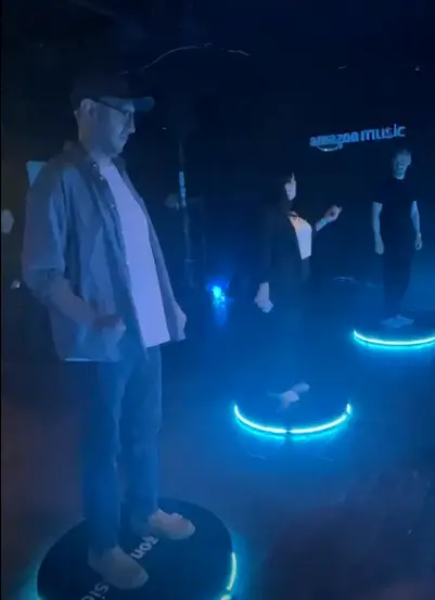 Interactive music mat device with LED lighting at a live event