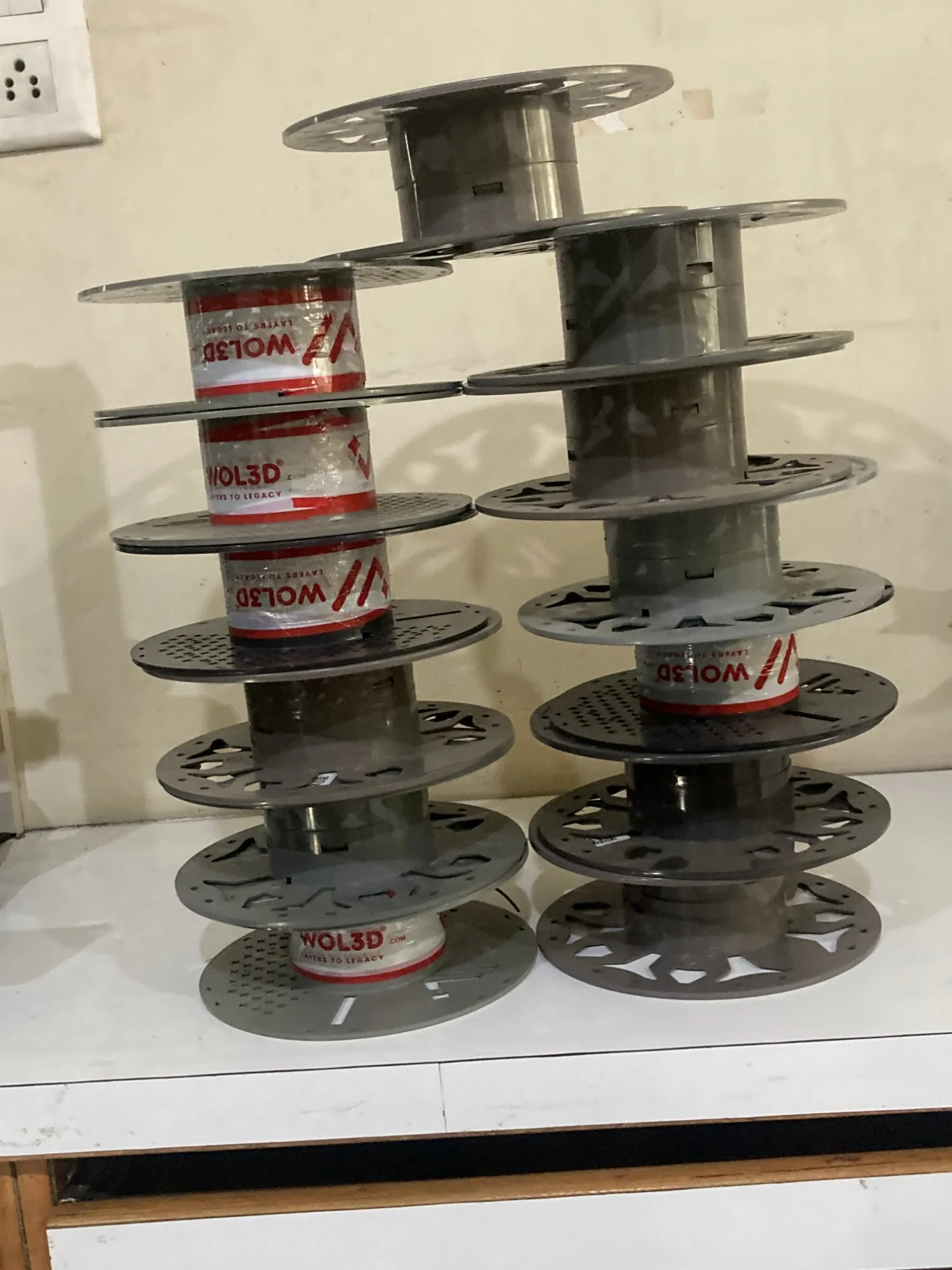 Stacked PLA and ABS filament spools from WOL3D at the DigitalMonk 3D printing lab