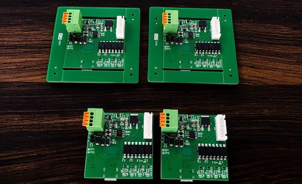 Batch of custom ESP32-S3 smart curtain automation controller PCBs in production